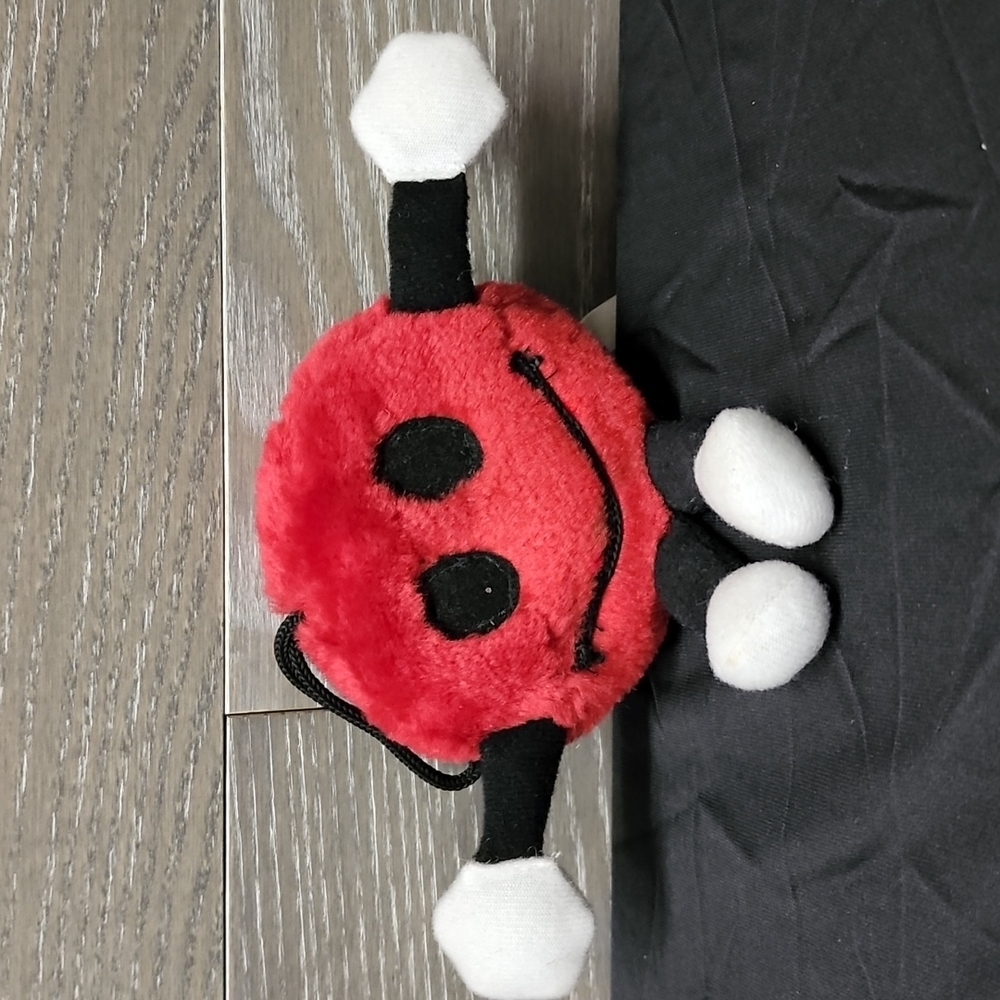 Miniature red M&M hanging plush